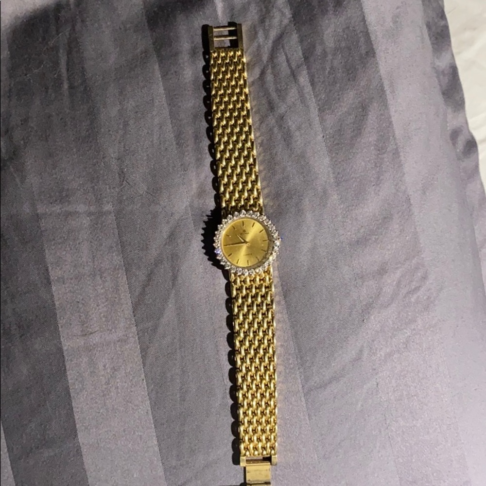 14k gold CYMA watch